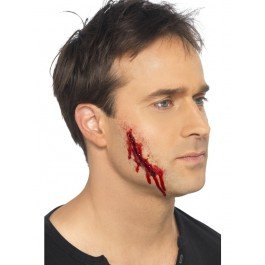 Smiffys Make-Up FX packaging showing a man's face with fake blood and a beige makeup pot.