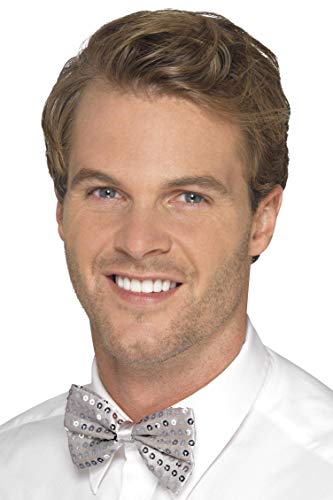 Man wearing a white shirt and a silver sequined bow tie.