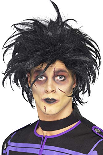Man with messy black wig, pale face, and dark makeup, wearing a black and purple costume.
