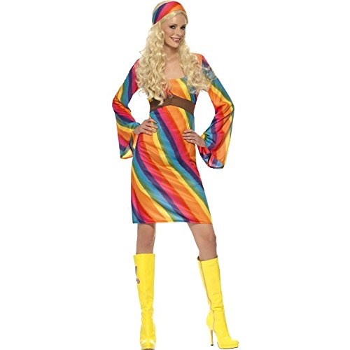 Woman in a rainbow-striped dress, headband, and yellow boots.