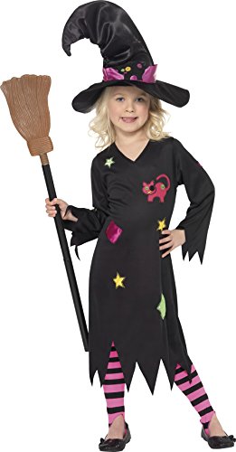 Young girl in a black witch costume, hat, and striped tights, holding a broom.