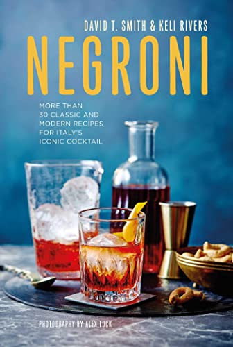 Book cover featuring a Negroni cocktail, glassware, and orange peel garnish.