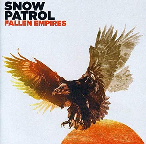 Snow Patrol album cover: eagle in flight over an orange sun.