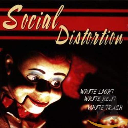 Album cover featuring a ventriloquist dummy face against a dark red and black background.