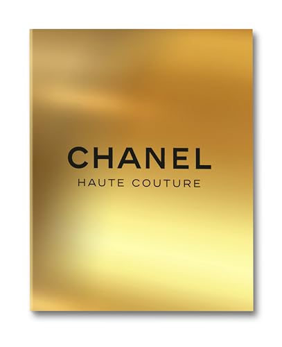 Gold book cover with black “CHANEL Haute Couture” text.