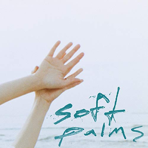 Yellow vinyl record with album cover featuring two hands reaching upwards against a beach background.