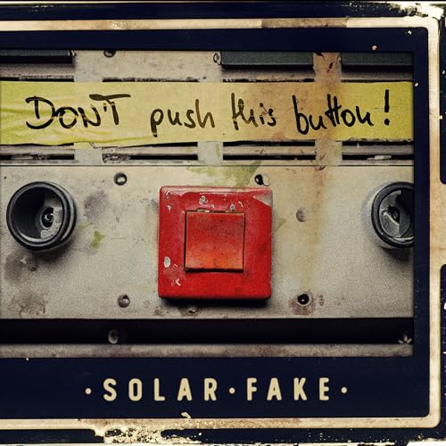 CD cover with a distressed metal box, red button, and text.
