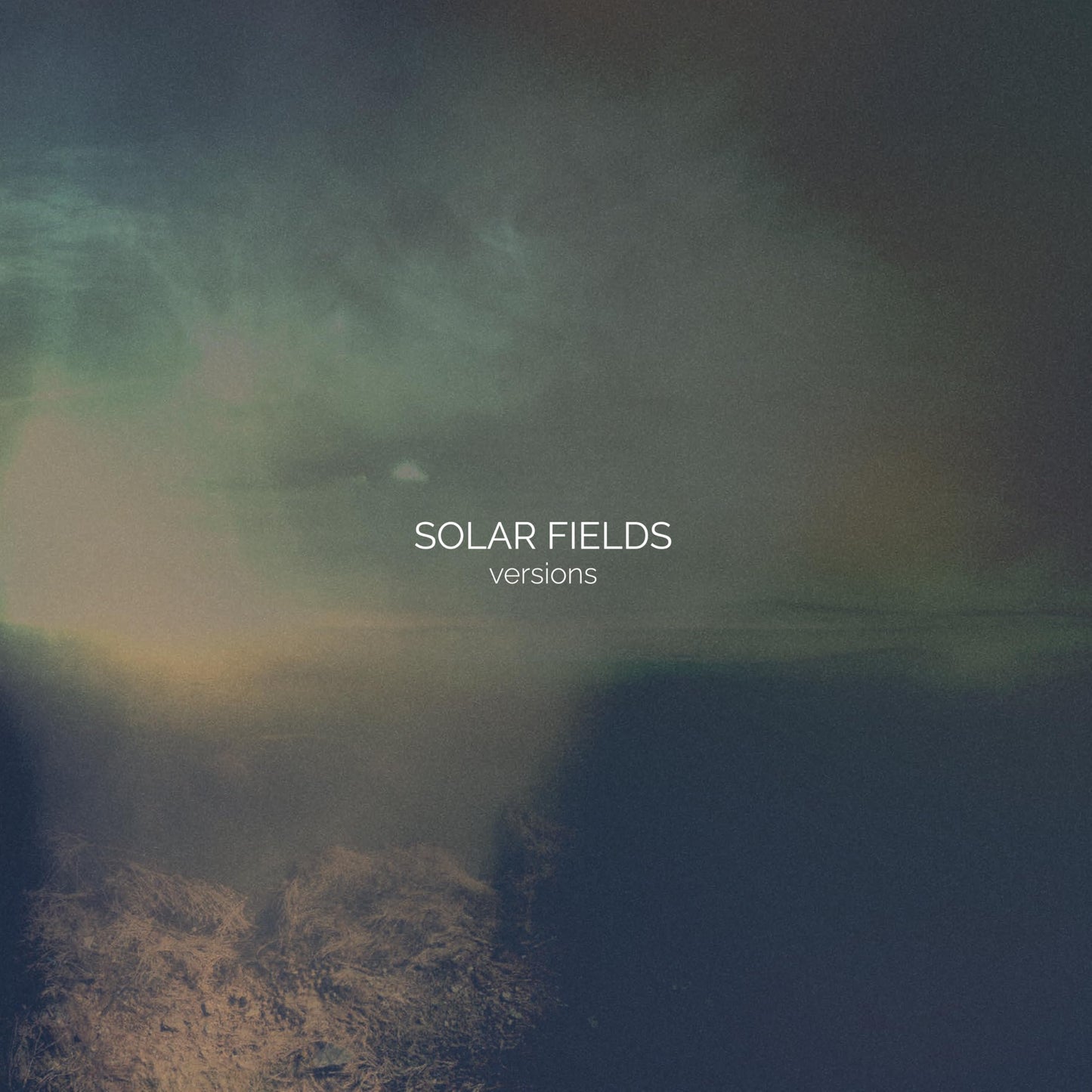 CD cover for “Solar Fields - Versions” with a blurred, atmospheric landscape.