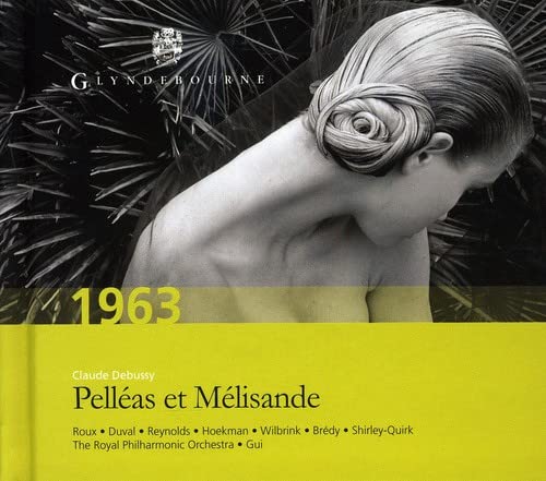 CD cover: woman with elaborate hairstyle, black and yellow background.