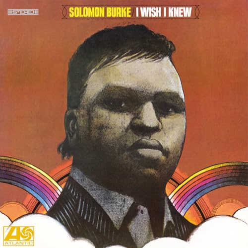 Solomon Burke album cover, portrait with rainbow and clouds, brown background.