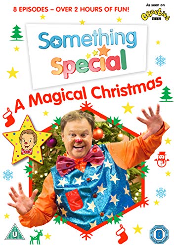 "Clown in a Christmas tree on a DVD cover with festive decorations."