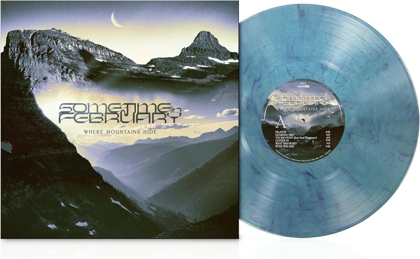 Blue and white marbled vinyl record with mountain range album art.
