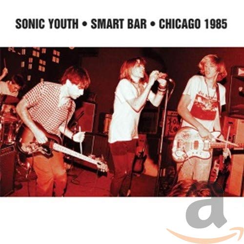 Sonic Youth performing live on stage in 1985, CD cover art.