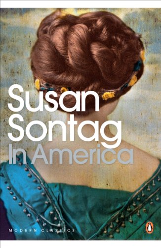 Book cover: “In America” by Susan Sontag, woman with floral headpiece.