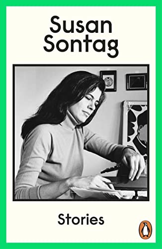 Book cover featuring a black and white photo of Susan Sontag writing at desk.
