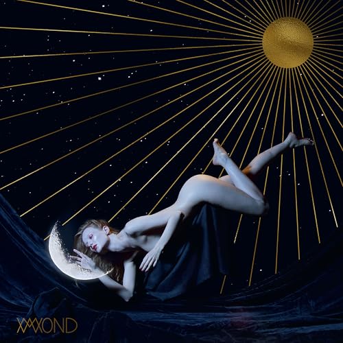Dark album cover with a reclining nude figure and golden sunburst.