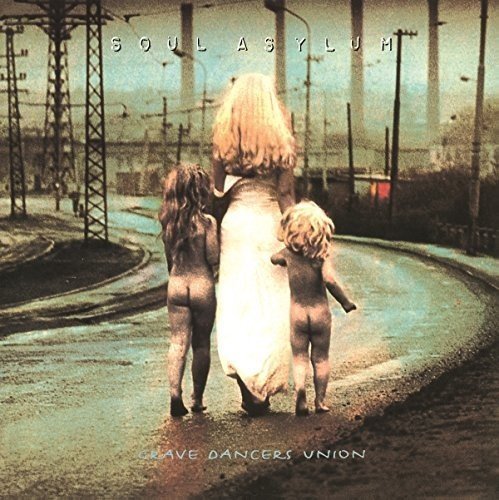 Vinyl album cover: woman and two children walking down a road together.