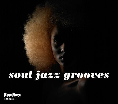 CD cover: woman with afro, dark background, "soul jazz grooves" text.
