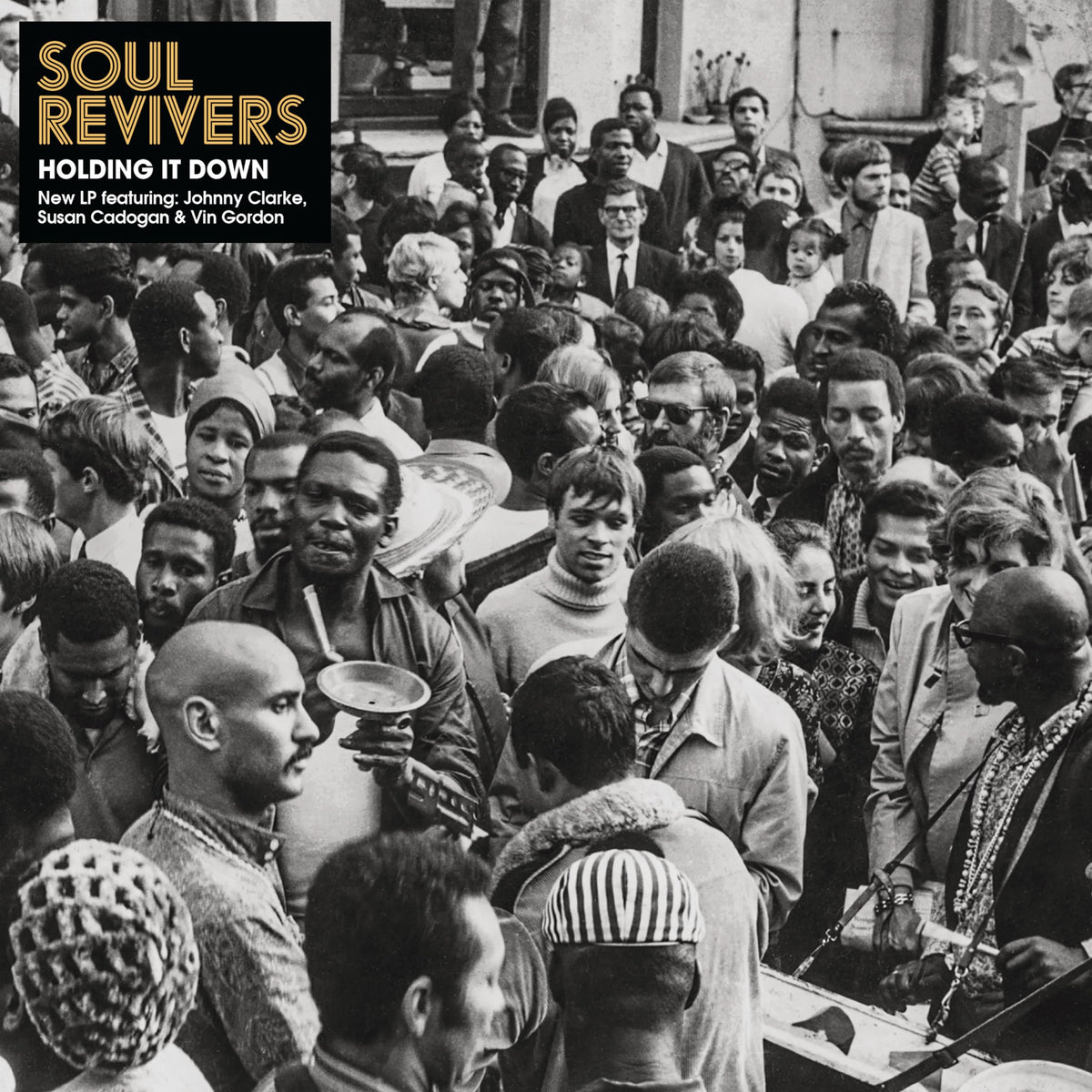 CD cover: black and white photo of a crowded street scene.