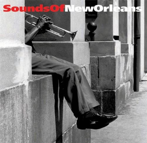 Black and white album cover featuring a musician playing trumpet.