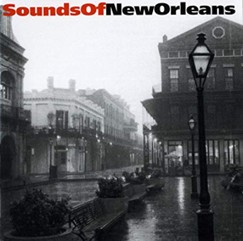 Black and white CD cover depicting a rainy New Orleans street scene.