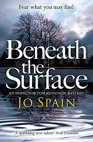 Book cover: dark water, bare tree, and title "Beneath the Surface".