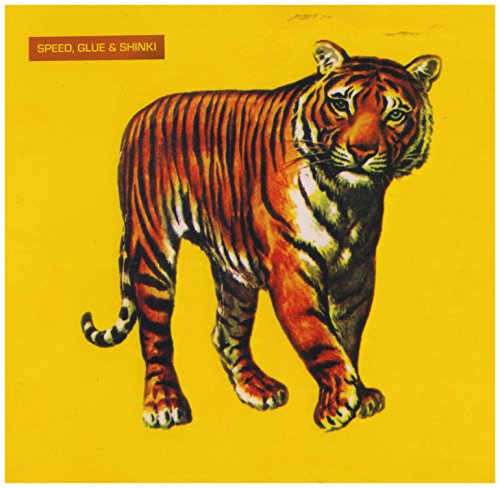 Yellow album cover featuring a painted tiger walking forward.