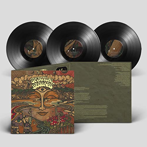 Three black vinyl records with a colorful, illustrated album cover.