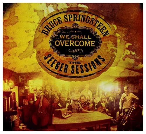 Bruce Springsteen album cover featuring a band in a rustic room.