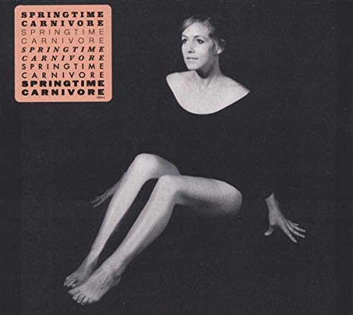 CD cover featuring a seated woman in black against a dark background.