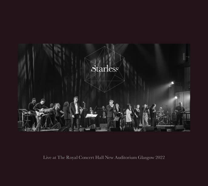 Black and white album cover featuring a band performing on stage.