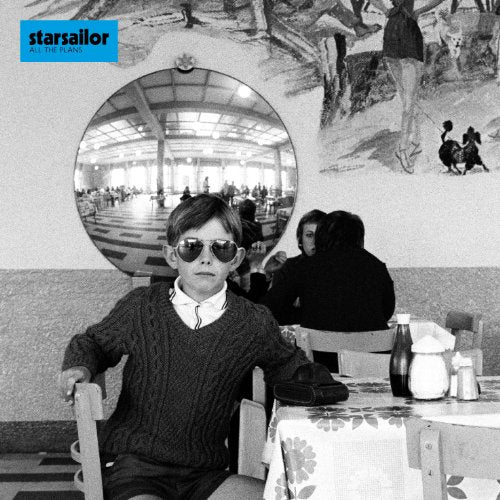 Starsailor album cover: boy in sunglasses at a diner, black and white.