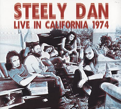 Steely Dan album cover: band photo with vintage furniture and plants.