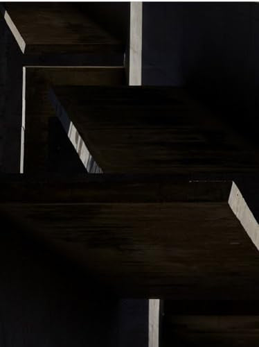 Abstract geometric composition of dark wood and light lines.