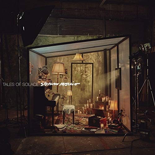 CD cover: dimly lit room interior with piano, lamps, and vintage objects.