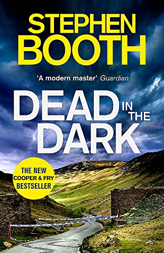 Book cover: “Dead in the Dark” with a crime scene landscape.