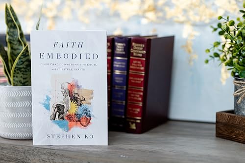 Book cover, “Faith Embodied,” with illustrated figure and stacked books nearby.