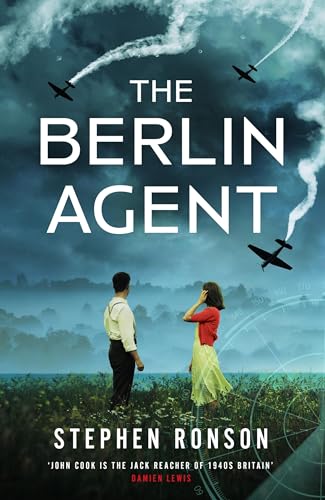 A man and woman stand in a field looking at airplanes in a cloudy sky.