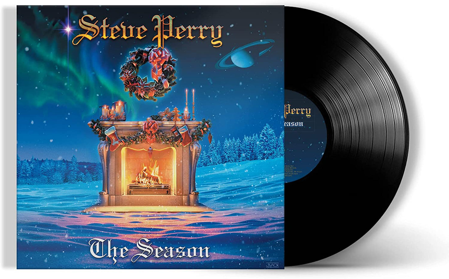 Vinyl record sleeve with festive winter scene and fireplace, partially covering black vinyl.