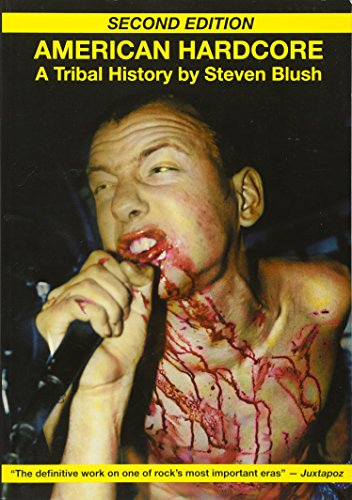 Book cover showing a shirtless, bloodied man singing into a microphone on stage.