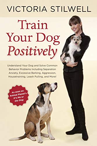Book cover featuring dog trainer Victoria Stilwell with two dogs.