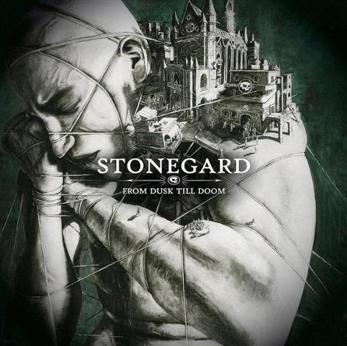 CD cover: sketch of a bound figure with a city on their back.