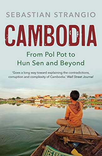 A book cover with a boy on a boat overlooking a village and water.