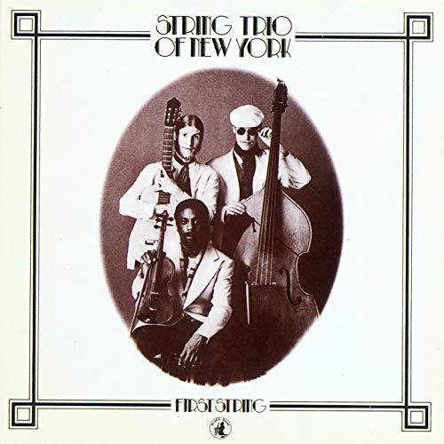 Black and white album cover featuring three musicians with string instruments.
