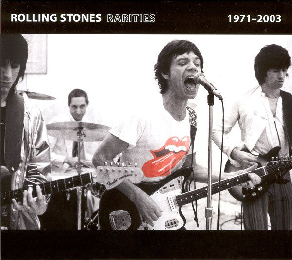 Black and white photo of The Rolling Stones performing live.