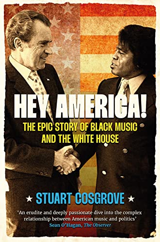 Book cover: two men shaking hands in front of a faded American flag.