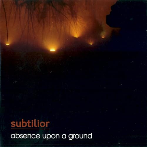 CD cover with dark, blurred landscape and glowing lights.