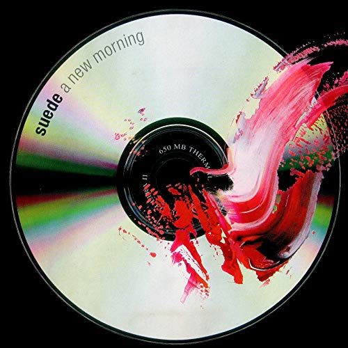 CD disc with Suede A New Morning text and a red paint brush stroke.