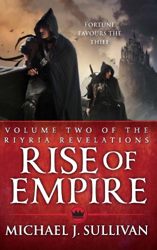 Two hooded figures in dark cloaks stand before a castle on a book cover.