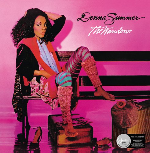 Donna Summer album cover featuring a woman sitting on a bench with pink background.